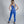 Modella con leggings con tecnologia FIR colore active indaco indossati a vita bassa lato posteriore Gsclosure.