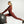 Modella indossa i leggings color mogano Gsclosure per mostrare comfort e vestibilità durante l'attività fisica.