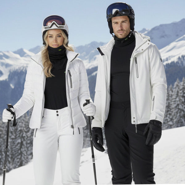 Coppia sulla neve con abbigliamento termico e scaldacollo tecnologico Gsclosure.